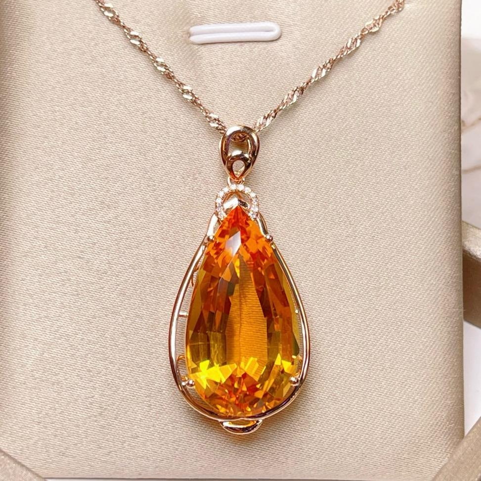 14k Gold 19.93 Ctw Natural Citrine & Diamond Pendant( Without Chain ): Ref:231133069 // gold content:14k gold // main gemstone:citrine // shape:pear // carat weight:19. 9ct // color:yellow // treatment:natural // // adjacent gemstone 2 : diamond // number of stones:12