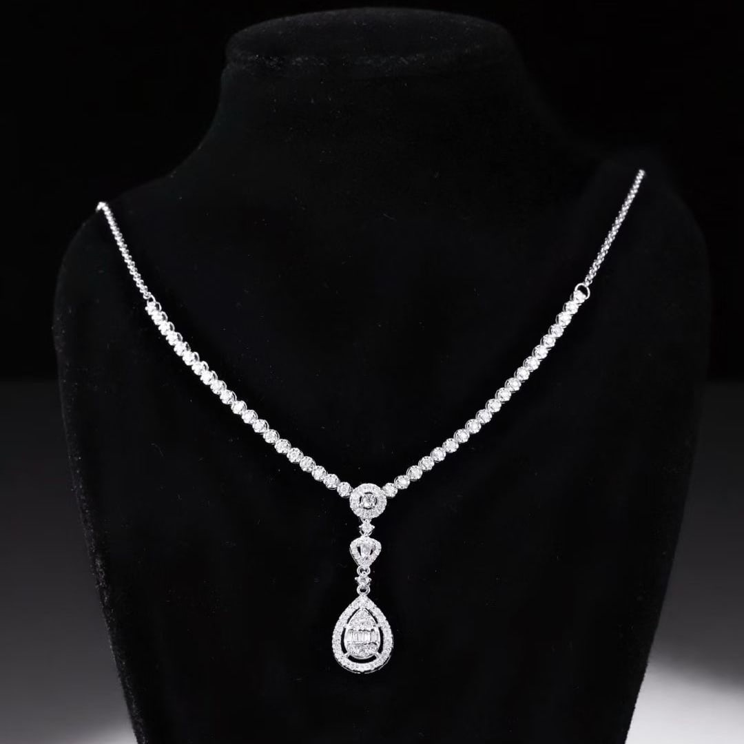 14k Gold 1.08 Ct Natural H Diamond Necklace: Ref:231133086 // gold content:14k gold // main gemstone:diamond // shape:multiple // carat weight:1. 08ct // clarity grade:vs-si // color:h // treatment:natural // High Estimate: 6600Low Estimate: