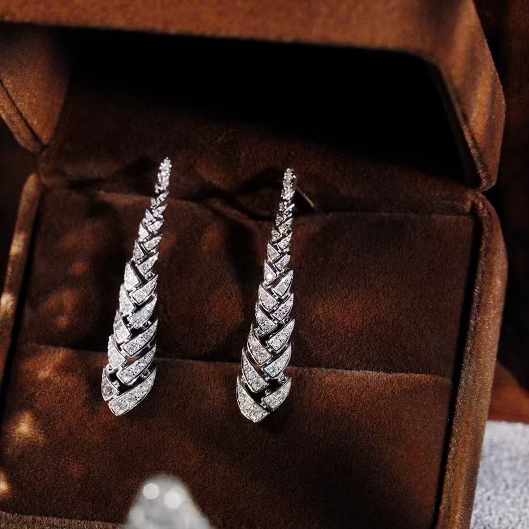 14k Gold 0.68 Ct Natural H Diamond Earrings: Ref:231133136 // gold content:14k gold // main gemstone:diamond // shape:round // carat weight:0. 68ct // clarity grade:vs-si // color:h // treatment:natural // cut grade:g // Condition: NewLow