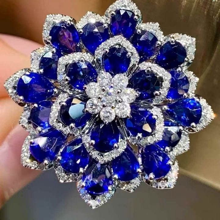 14k Gold 5.2 Ct Natural Sapphire & Diamond Ring: Ref:231133171 // gold content:14k gold // ring size:7. 25us // // main gemstone:sapphire // shape:pear // carat weight:5. 2ct // color:blue // treatment:natural // // adjacent gemstone 2 : diamond