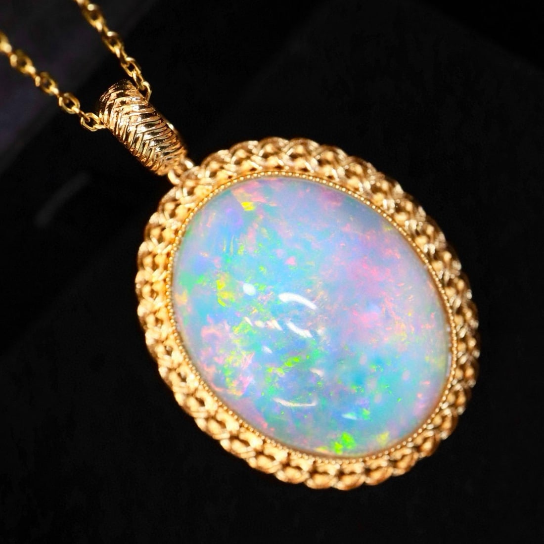 14k Gold 19.63 Ct Natural Opal Pendant( Without Chain ): Ref:231133175 // gold content:14k gold // main gemstone:opal // shape:oval // carat weight:19. 63ct // color:color // treatment:natural // Condition: NewLow Estimate: 6200High Estimate: 9200