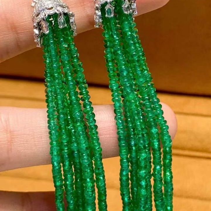14k Gold 41 Ct Natural Emerald & Diamond & Sapphire Earrings: Ref:231133209 // gold content:14k gold // main gemstone:emerald // shape:bead // carat weight:41ct // color:green // treatment:natural // // adjacent gemstone 2 : diamond // shape:round // clarity
