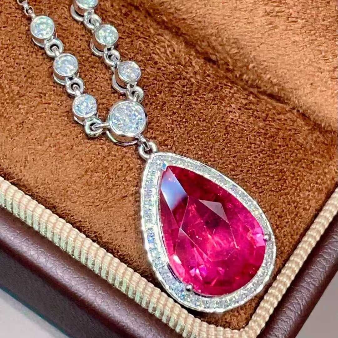 14k Gold 4.25 Ctw Natural Tourmaline & Diamond Necklace: Ref:231133247 // gold content:14k gold // main gemstone:tourmaline // shape:pear // carat weight:3. 8ct // color:red // treatment:natural // // adjacent gemstone 2 : diamond // shape:round // carat