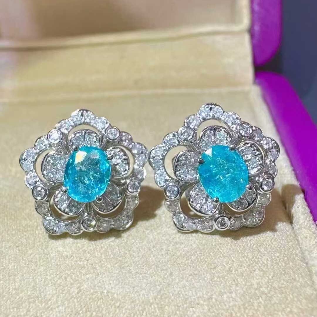 14k Gold 1.32 Ctw Natural Paraiba Tourmaline & Diamond Earrings: Ref:231133248 // gold content:14k gold // main gemstone:paraiba tourmaline // shape:oval // carat weight:0. 92ct // color:neon blue // treatment:natural // // adjacent gemstone 2 : diamond //