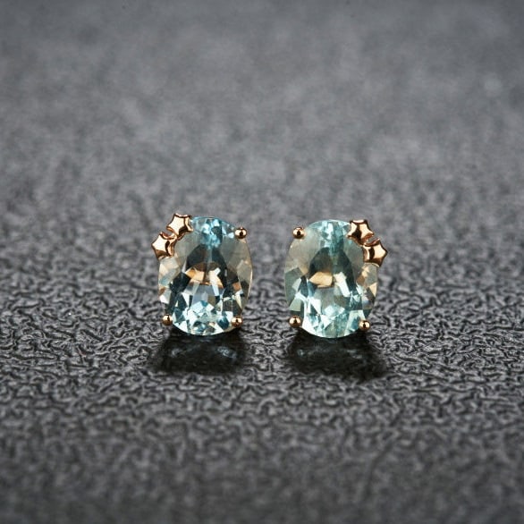14k Gold 3.66 Ct Natural Aquamarine Earrings: Ref:231134025 // gold content:14k gold // main gemstone:aquamarine // shape:oval // carat weight:3. 66ct // color:blue // treatment:natural // High Estimate: 3300 Condition: New Low Estimate: 2200