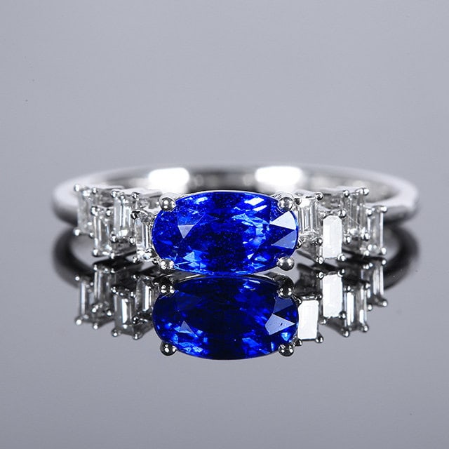 14k Gold 1.56 Ctw Natural Sapphire & Diamond Ring: Ref:231134041 // gold content:14k gold // ring size:7. 25us // // main gemstone:sapphire // shape:oval // carat weight:1. 35ct // color:blue // treatment:natural // // adjacent gemstone 2 :