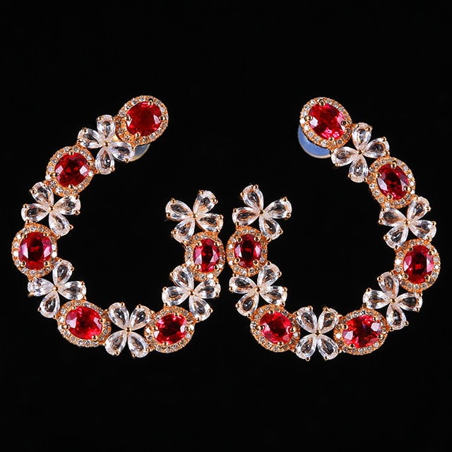 14k Gold 3.73 Ctw Natural Ruby & Diamond Earrings: Ref:231134043 // gold content:14k gold // main gemstone:ruby // shape:oval // carat weight:3. 14ct // color:red // treatment:natural // // adjacent gemstone 2 : diamond // number of stones:30 //
