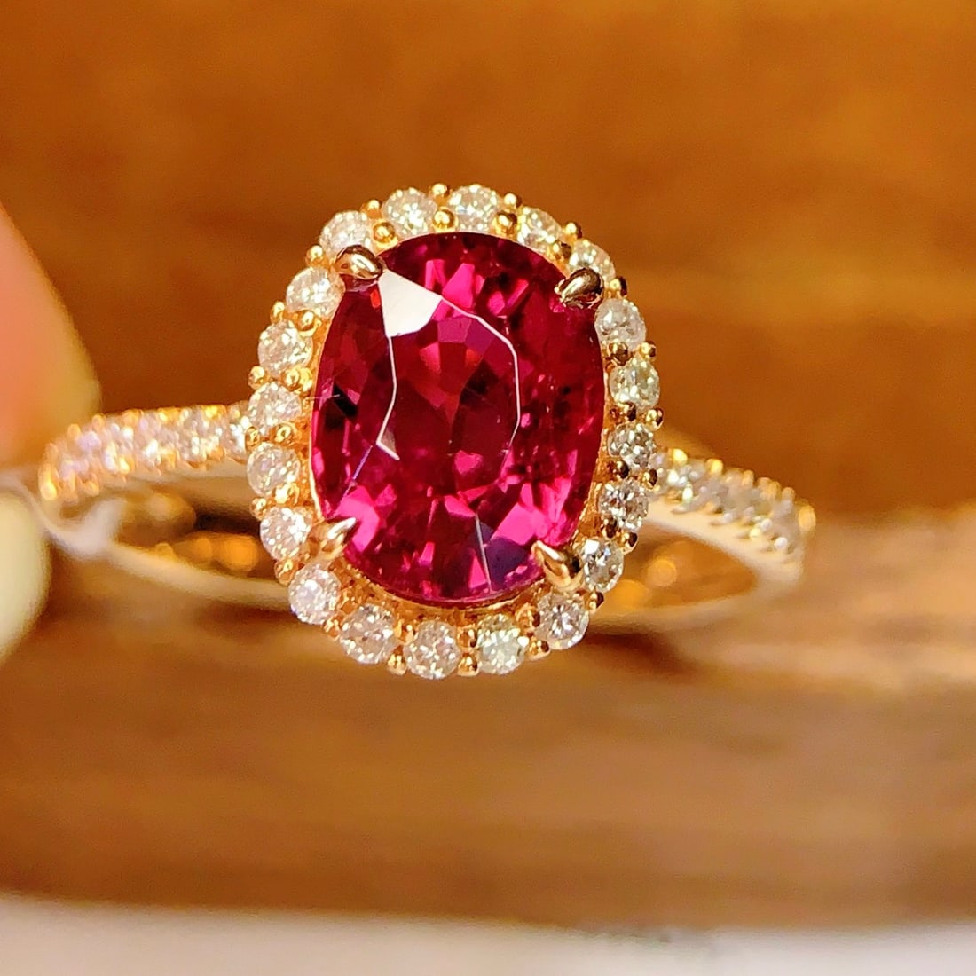 14k Gold 2.3 Ct Natural Tourmaline & Diamond Ring: Ref:231134053 // gold content:14k gold // ring size:7. 25us // // main gemstone:tourmaline // shape:oval // carat weight:2. 3ct // color:red // treatment:natural // // adjacent gemstone 2 :