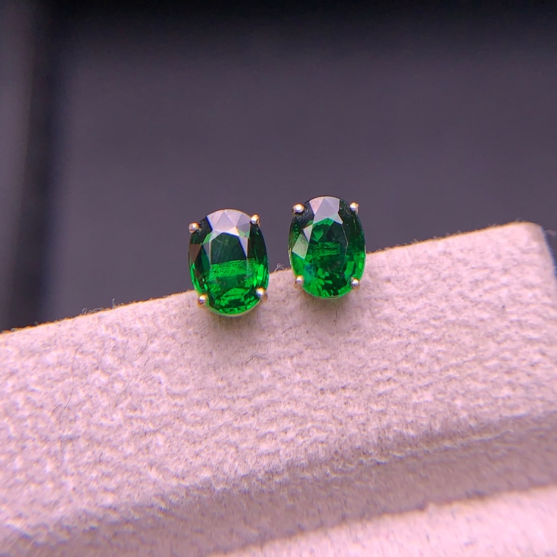 14k Gold 1.8 Ct Vivid Green Natural Tsavorite Earrings: Ref:231134108 // gold content:14k gold // main gemstone:tsavorite // shape:oval // carat weight:1. 8ct // color:vivid green // treatment:natural // Low Estimate: 1500Condition: NewHigh Estimate: 2300