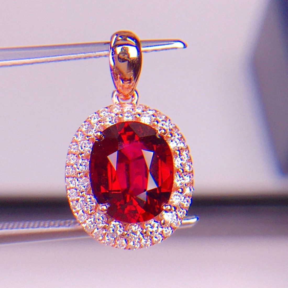 14k Gold 2.01 Ct Natural Tourmaline & Diamond Pendant( Without Chain ): Ref:231134125 // gold content:14k gold // main gemstone:tourmaline // shape:oval // carat weight:2. 01ct // color:red // treatment:natural // // adjacent gemstone 2 : diamond // shape:round //