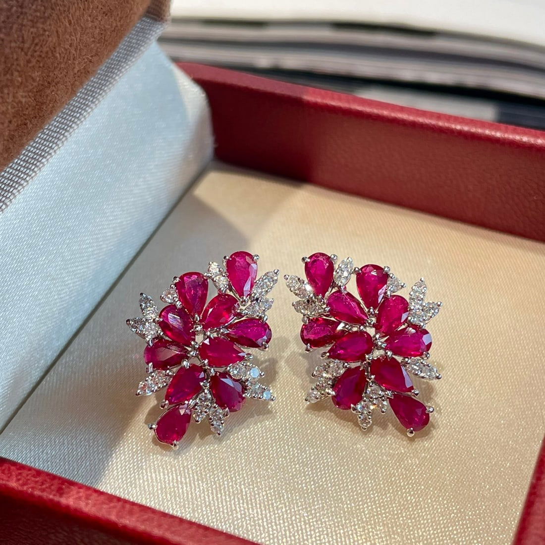 14k Gold 3.4 Ct Natural Ruby & Diamond Earrings: Ref:231134136 // gold content:14k gold // main gemstone:ruby // shape:pear // carat weight:3. 4ct // color:red // treatment:natural // // adjacent gemstone 2 : diamond // shape:round // clarity