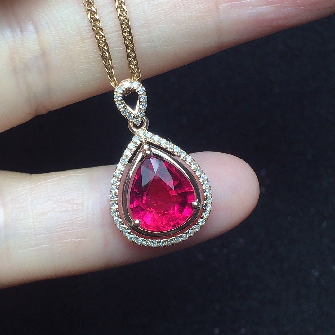 14k Gold 1.94 Ct Natural Tourmaline & Diamond Pendant( Without Chain ): Ref:231134149 // gold content:14k gold // main gemstone:tourmaline // shape:pear // carat weight:1. 94ct // color:red // treatment:natural // // adjacent gemstone 2 : diamond // number of stones:53 //