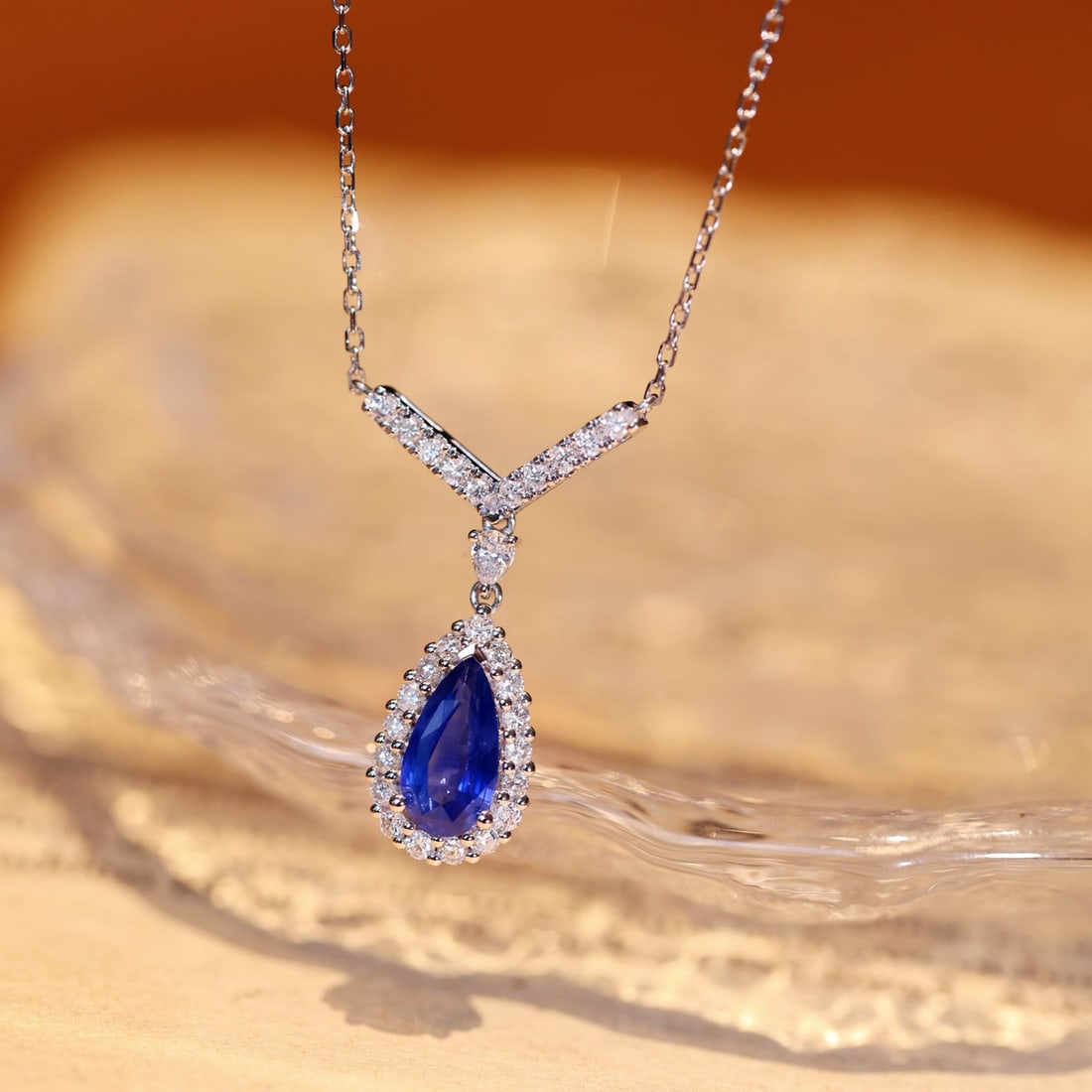 14k Gold 1.48 Ctw Natural Sapphire & Diamond Necklace: Ref:231134190 // gold content:14k gold // main gemstone:sapphire // shape:pear // carat weight:1. 04ct // color:blue // treatment:natural // // adjacent gemstone 2 : diamond // shape:multiple //