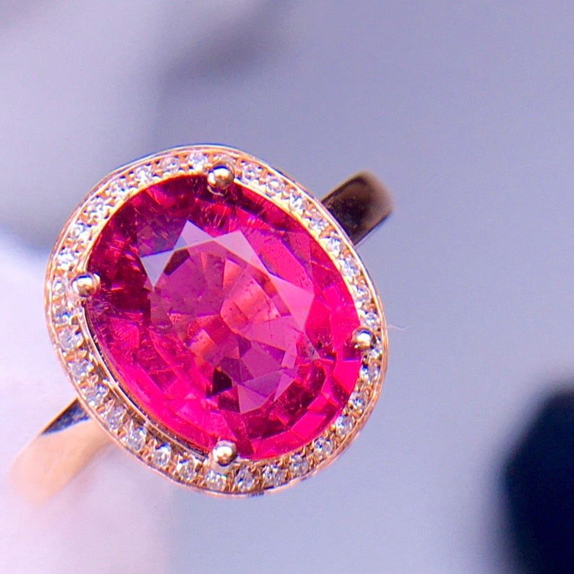 14k Gold 3.5 Ct Natural Tourmaline & Diamond Ring: Ref:231134217 // gold content:14k gold // ring size:7. 25us // // main gemstone:tourmaline // shape:oval // carat weight:3. 5ct // color:red // treatment:natural // // adjacent gemstone 2 :