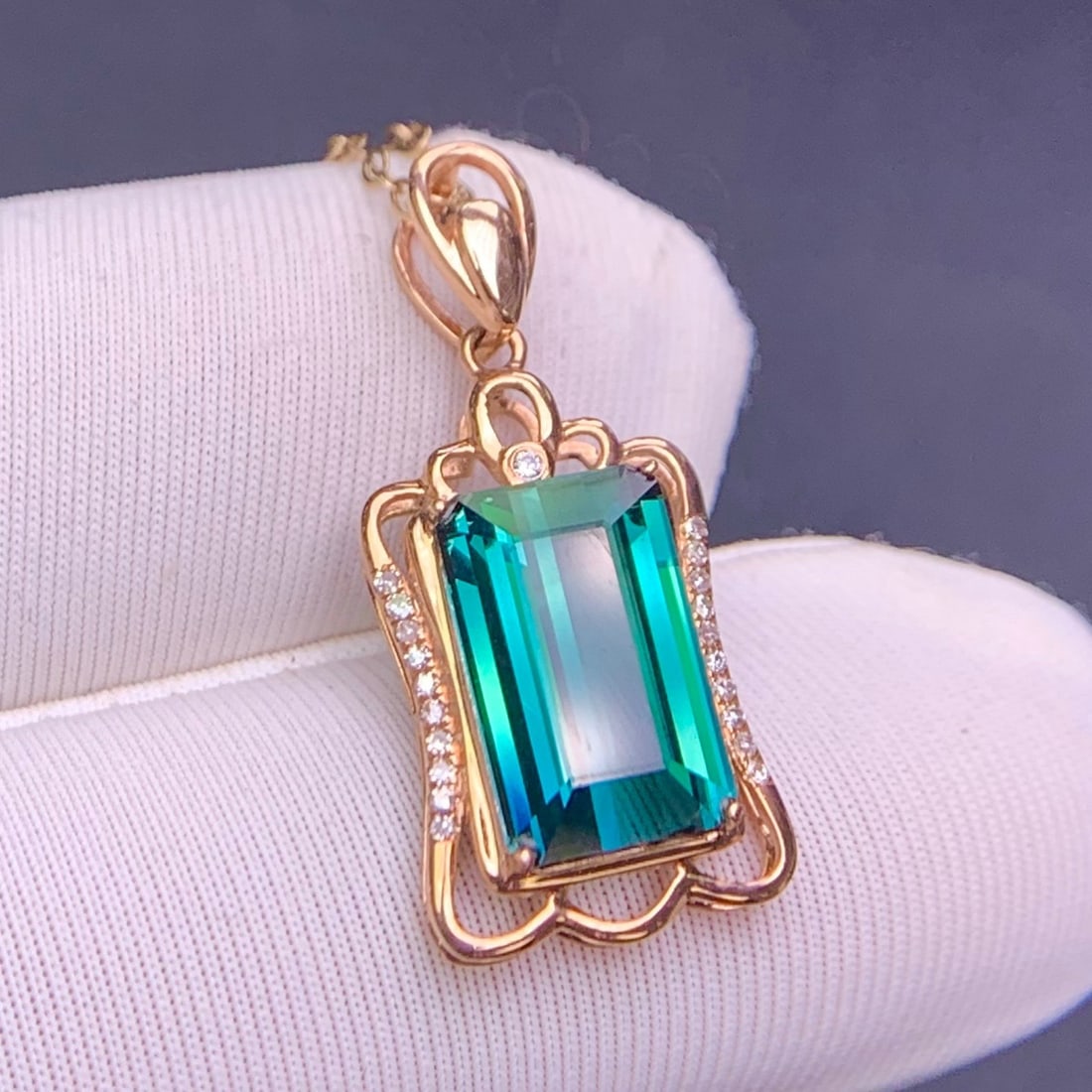 14k Gold 3.3 Ct Natural Tourmaline & Diamond Pendant( Without Chain ): Ref:231134335 // gold content:14k gold // main gemstone:tourmaline // shape:octagonal // carat weight:3. 3ct // color:bluish green // treatment:natural // // adjacent gemstone 2 : diamond //