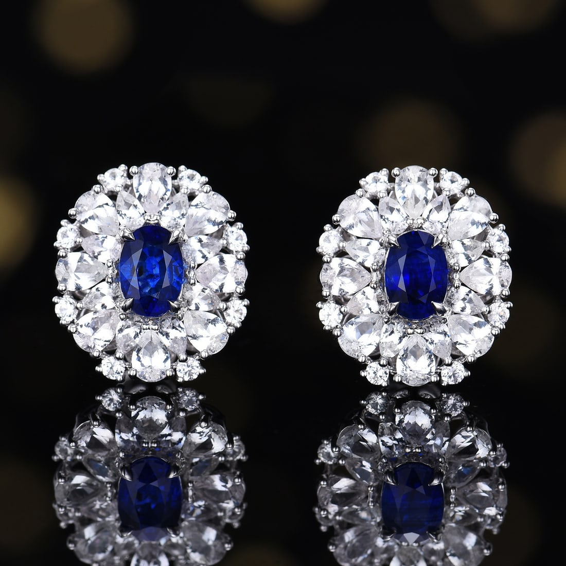 14k Gold 4.27 Ctw Natural Sapphire & Sapphire Earrings: Ref:231134423 // gold content:14k gold // main gemstone:sapphire // shape:oval // carat weight:1. 39ct // color:blue // treatment:natural // // adjacent gemstone 2 : sapphire // number of stones:48