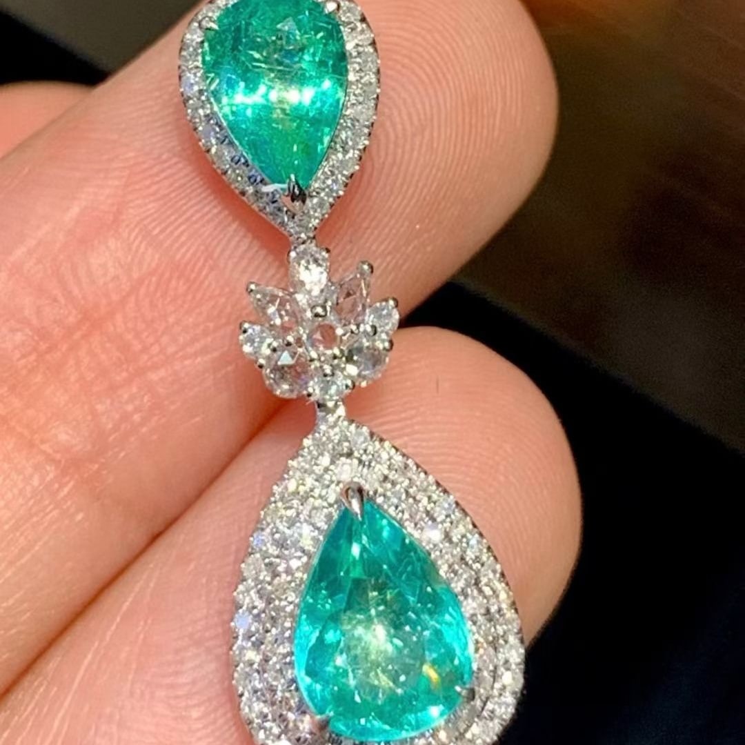 14k Gold 1.6 Ct Natural Paraiba Tourmaline & Diamond & Sapphire Pendant( Without Chain ): Ref:231129021 // gold content:14k gold // main gemstone:paraiba tourmaline // shape:pear // carat weight:1. 6ct // color:bluish green // treatment:natural // // adjacent gemstone 2 : diamond //