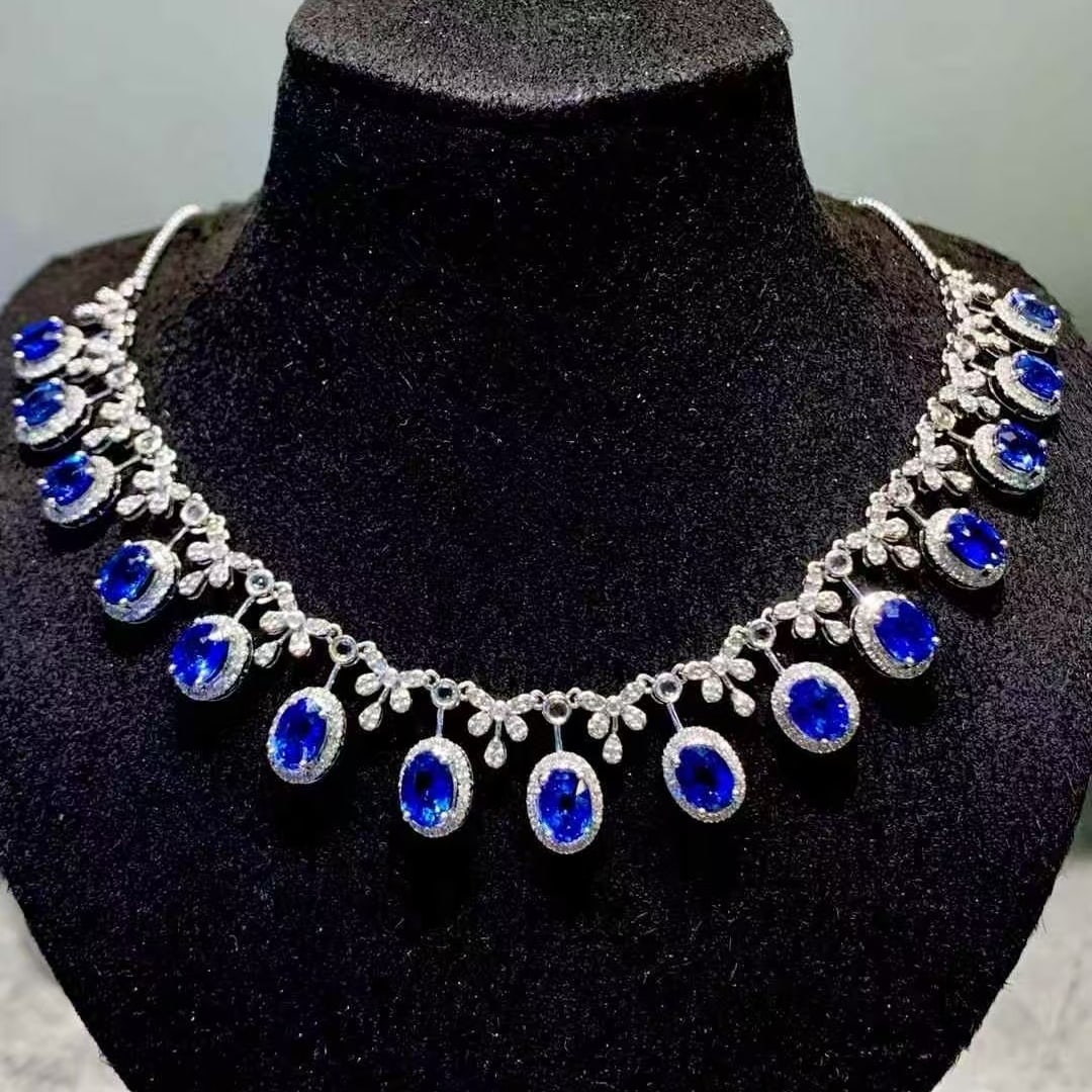 14k Gold 9.3 Ct Natural Sapphire & Diamond & Sapphire Necklace: Ref:231129034 // gold content:14k gold // main gemstone:sapphire // shape:oval // carat weight:9. 3ct // color:blue // treatment:natural // // adjacent gemstone 2 : diamond // shape:round //