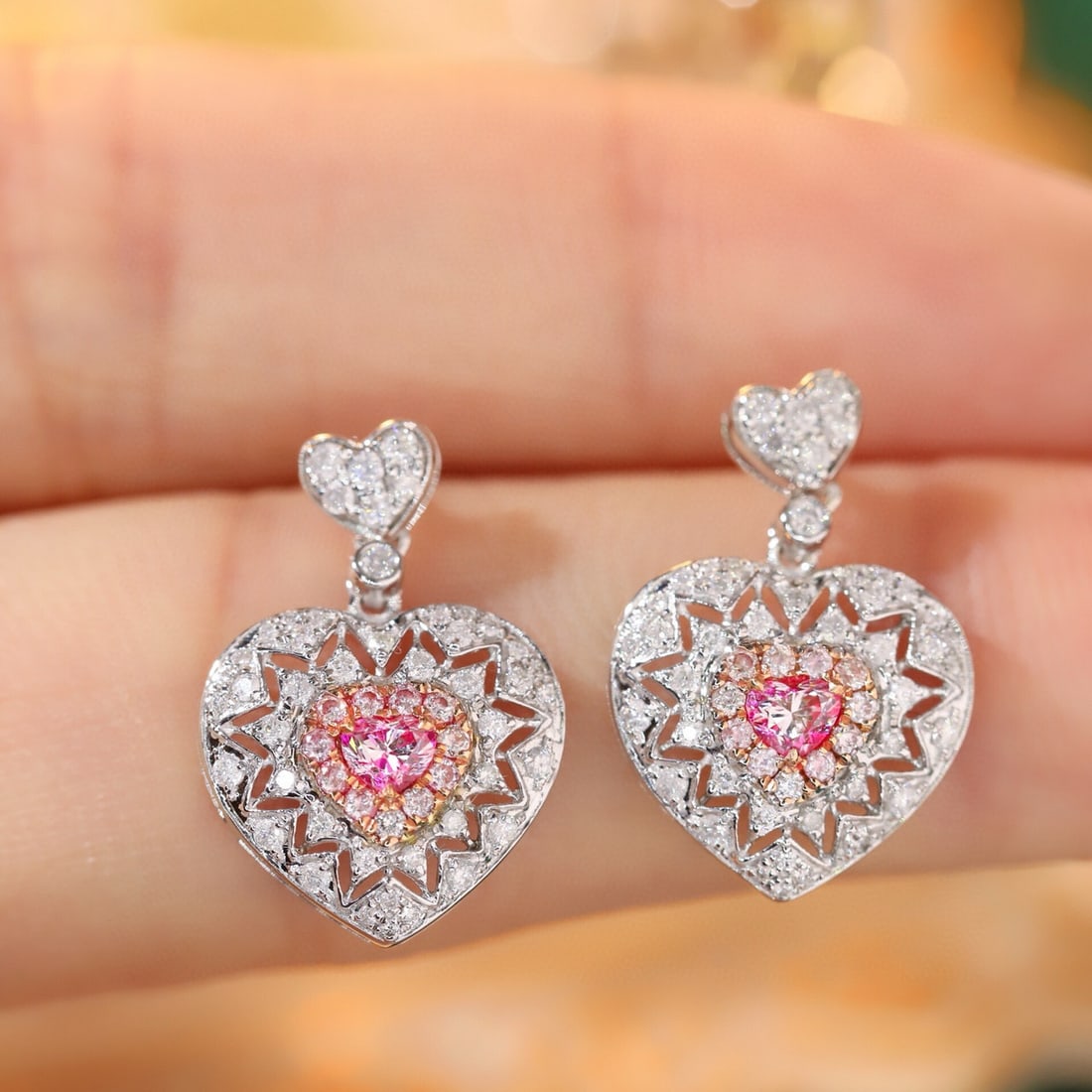 14k Gold 0.80 Ctw Natural Pink Diamond & Diamond Earrings: Ref:231129047 // gold content:14k gold // main gemstone:pink diamond // shape:heart // carat weight:0. 22ct // color:pink // treatment:natural // // adjacent gemstone 2 : diamond // shape:round // car