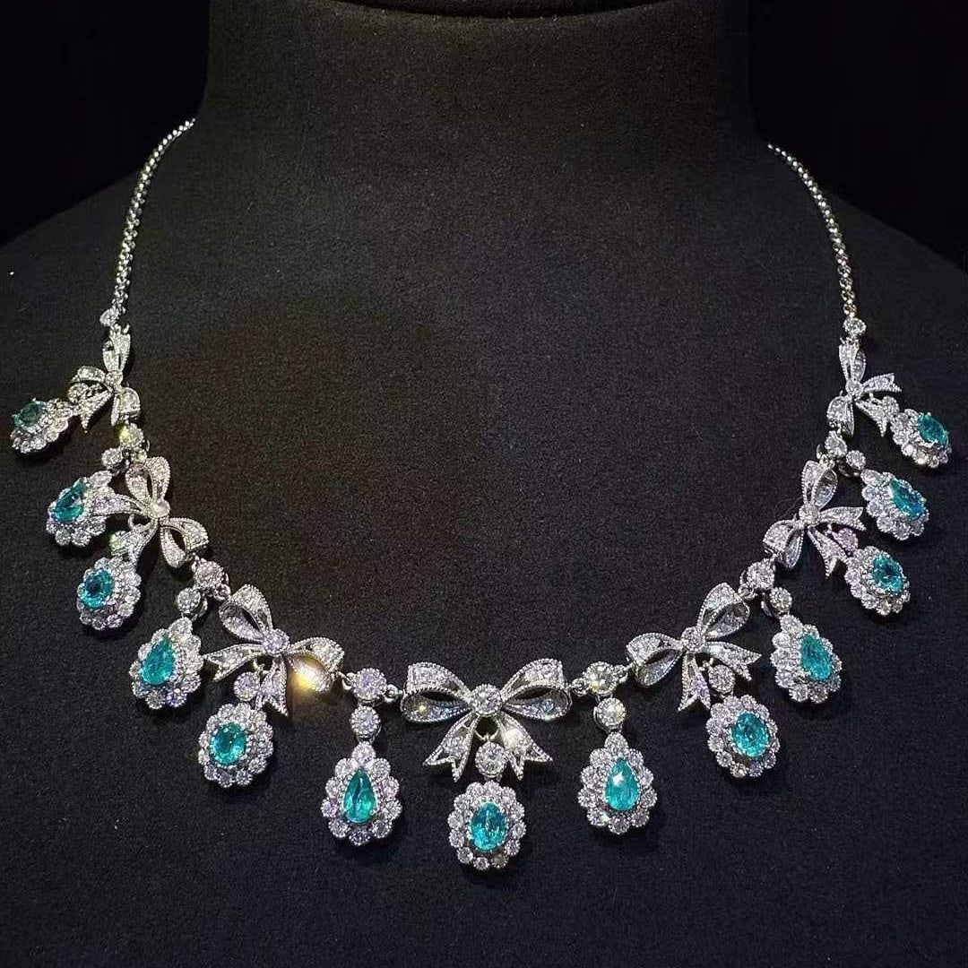 14k Gold 5.93 Ctw Natural Paraiba Tourmaline & Diamond Necklace: Ref:231129056 // gold content:14k gold // main gemstone:paraiba tourmaline // shape:multiple // carat weight:2. 29ct // color:blue // treatment:natural // // adjacent gemstone 2 : diamond // shape:rou