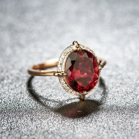 14k Gold 3.55 Ct Natural Tourmaline & Diamond Ring: Ref:231129059 // gold content:14k gold // ring size:7. 25us // // main gemstone:tourmaline // shape:oval // carat weight:3. 55ct // color:red // treatment:natural // // adjacent gemstone 2 :