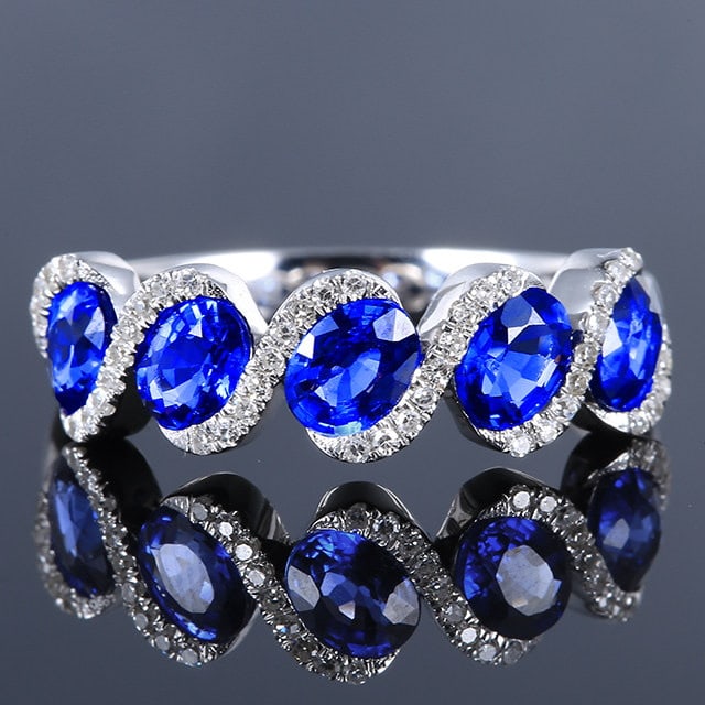 14k Gold 1.93 Ctw Natural Sapphire & Diamond Ring: Ref:231129076 // gold content:14k gold // ring size:7. 25us // // main gemstone:sapphire // shape:oval // carat weight:1. 79ct // color:blue // treatment:natural // // adjacent gemstone 2 :