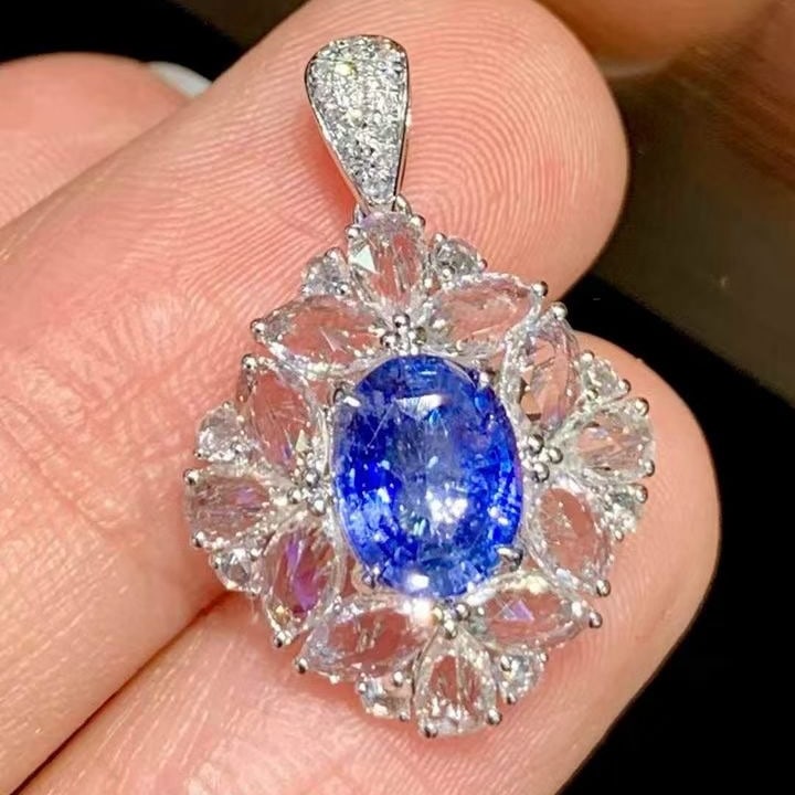 14k Gold 1.45 Ct Natural Sapphire & Diamond & Sapphire Pendant( Without Chain ): Ref:231129082 // gold content:14k gold // main gemstone:sapphire // shape:oval // carat weight:1. 45ct // color:blue // treatment:natural // // adjacent gemstone 2 : diamond // shape:round //