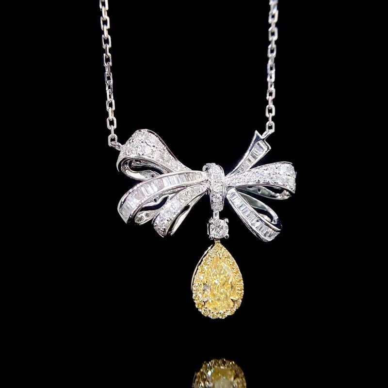 14k Gold 1.06 Ctw Natural Yellow Diamond & Diamond Necklace: Ref:231129090 // gold content:14k gold // main gemstone:yellow diamond // shape:pear // carat weight:0. 5ct // color:yellow // treatment:natural // // adjacent gemstone 2 : diamond //