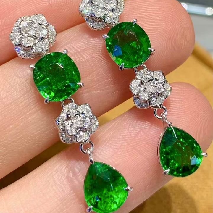 14k Gold 5.05 Ct Vivid Green Natural Tsavorite & Diamond Earrings: Ref:231129107 // gold content:14k gold // main gemstone:tsavorite // shape:multiple // carat weight:5. 05ct // color:vivid green // treatment:natural // // adjacent gemstone 2 : diamond //