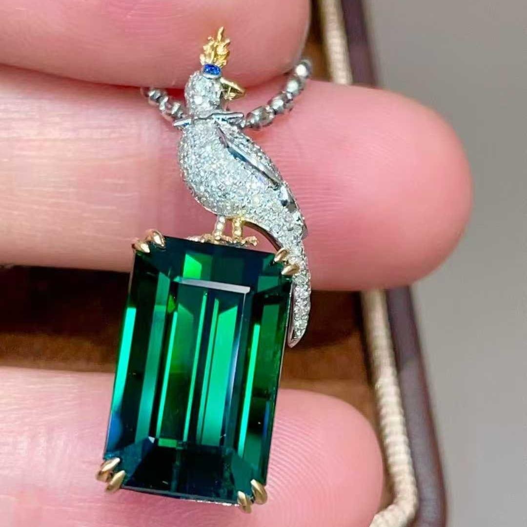 14k Gold 11.0 Ctw Natural Tourmaline & Diamond Pendant( Without Chain ): Ref:231129112 // gold content:14k gold // main gemstone:tourmaline // shape:octagonal // carat weight:10. 7ct // color:green // treatment:natural // // adjacent gemstone 2 : diamond // shape:round