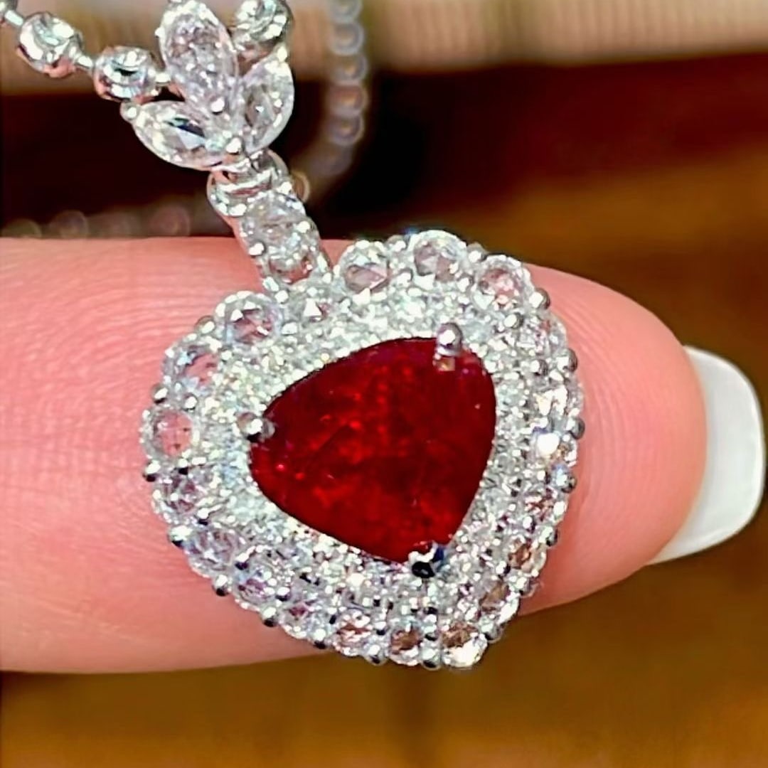 14k Gold 1 Ct Vivid Red Natural Ruby & Sapphire & Diamond Pendant( Without Chain ): Ref:231129122 // gold content:14k gold // main gemstone:ruby // shape:pear // carat weight:1ct // color:vivid red // treatment:natural // // adjacent gemstone 2 : sapphire // shape:multiple //