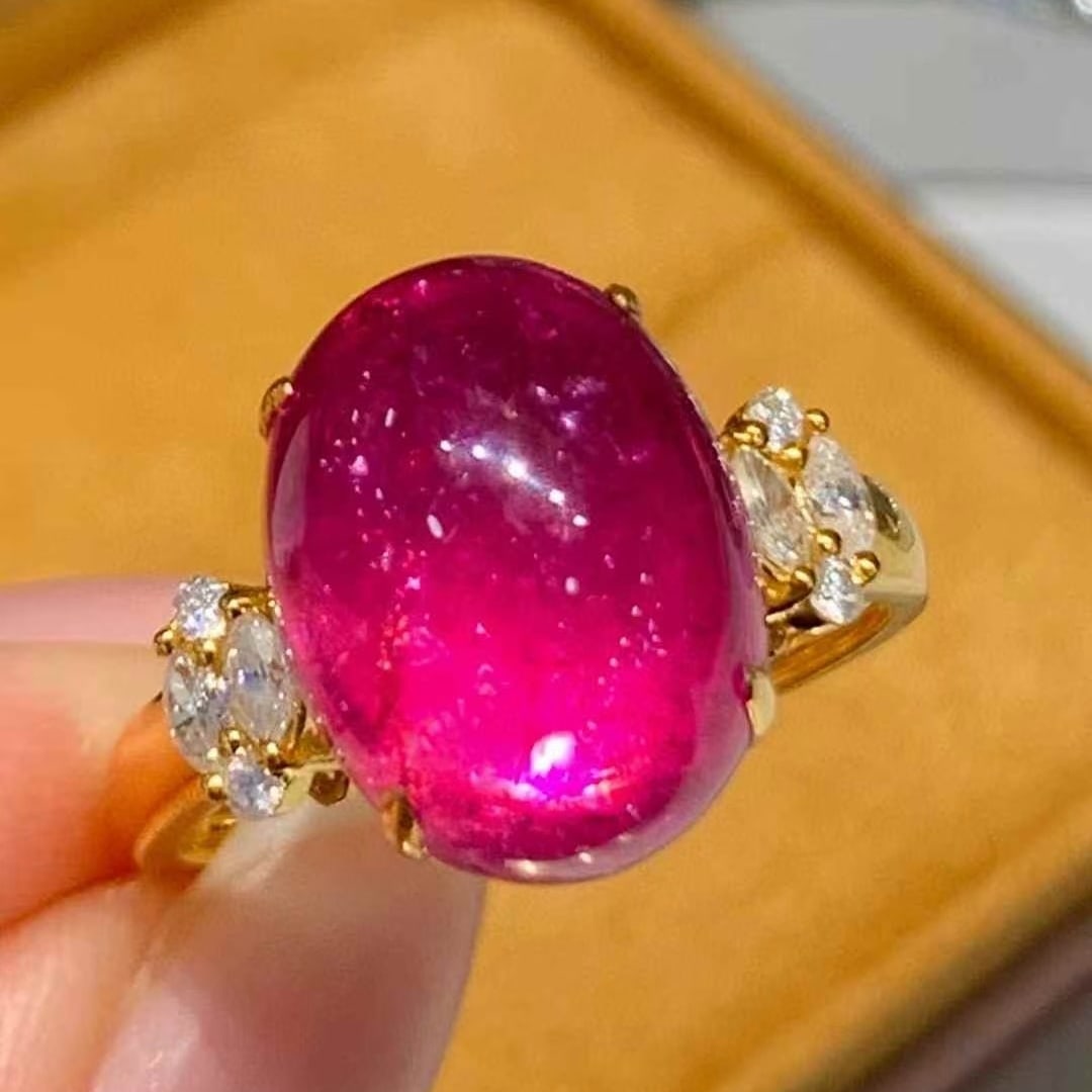 14k Gold 8.65 Ct Natural Tourmaline & Diamond Ring: Ref:231129152 // gold content:14k gold // ring size:7. 25us // // main gemstone:tourmaline // shape:oval // carat weight:8. 65ct // color:red // treatment:natural // // adjacent gemstone 2 :