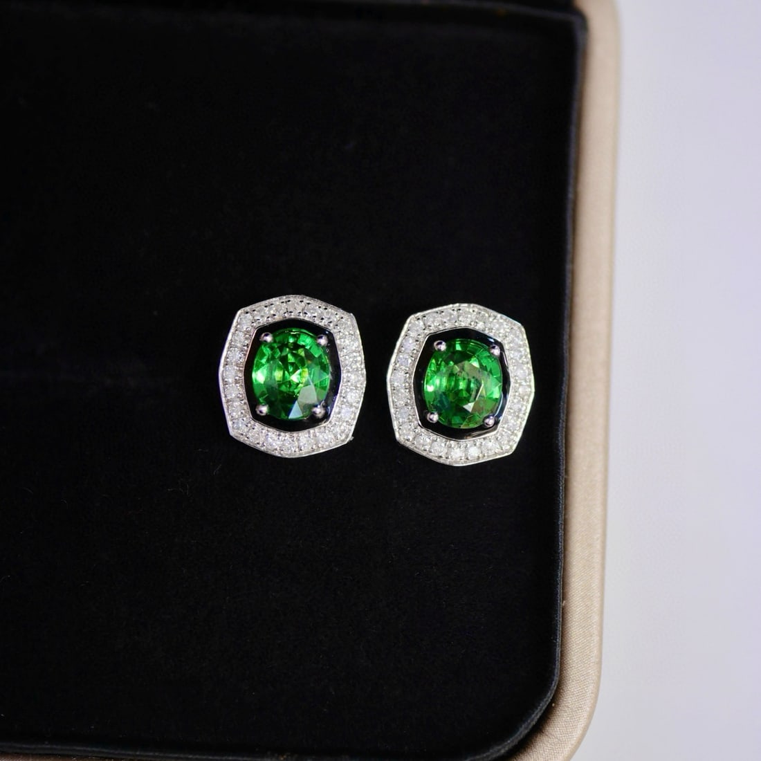14k Gold 1.45 Ct Vivid Green Natural Tsavorite & Diamond Earrings: Ref:231129157 // gold content:14k gold // main gemstone:tsavorite // shape:oval // carat weight:1. 45ct // color:vivid green // treatment:natural // // adjacent gemstone 2 : diamond // shape:round