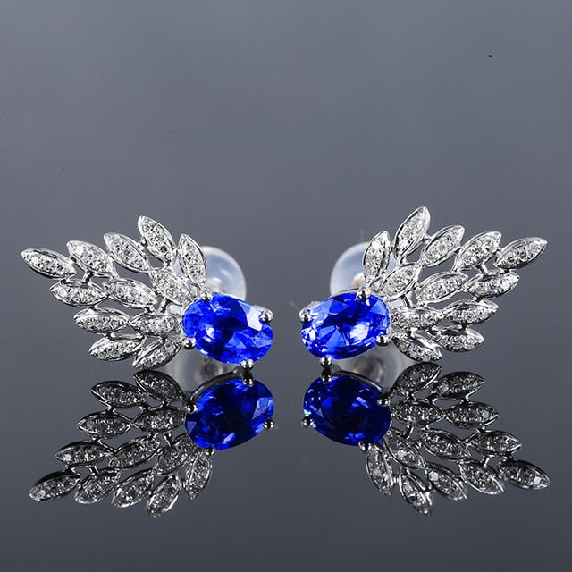 14k Gold 1.31 Ctw Natural Sapphire & Diamond Earrings: Ref:231129172 // gold content:14k gold // main gemstone:sapphire // shape:oval // carat weight:1. 1ct // color:blue // treatment:natural // // adjacent gemstone 2 : diamond // number of stones:72 // s