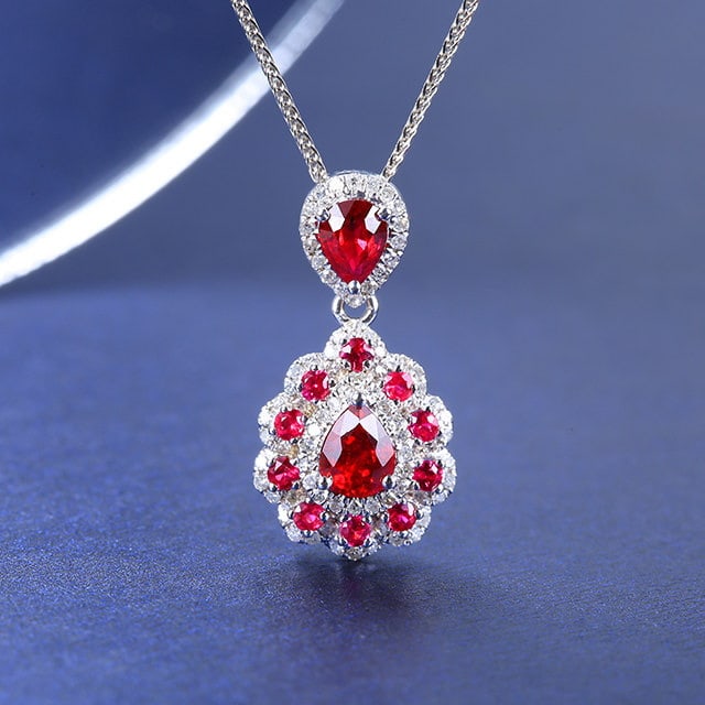 14k Gold 1.17 Ctw Vivid Red Natural Ruby & Ruby Pendant( Without Chain ): Ref:231129174 // gold content:14k gold // main gemstone:ruby // shape:pear // carat weight:0. 9ct // color:vivid red // treatment:natural // // adjacent gemstone 2 : ruby // shape:round // carat weigh