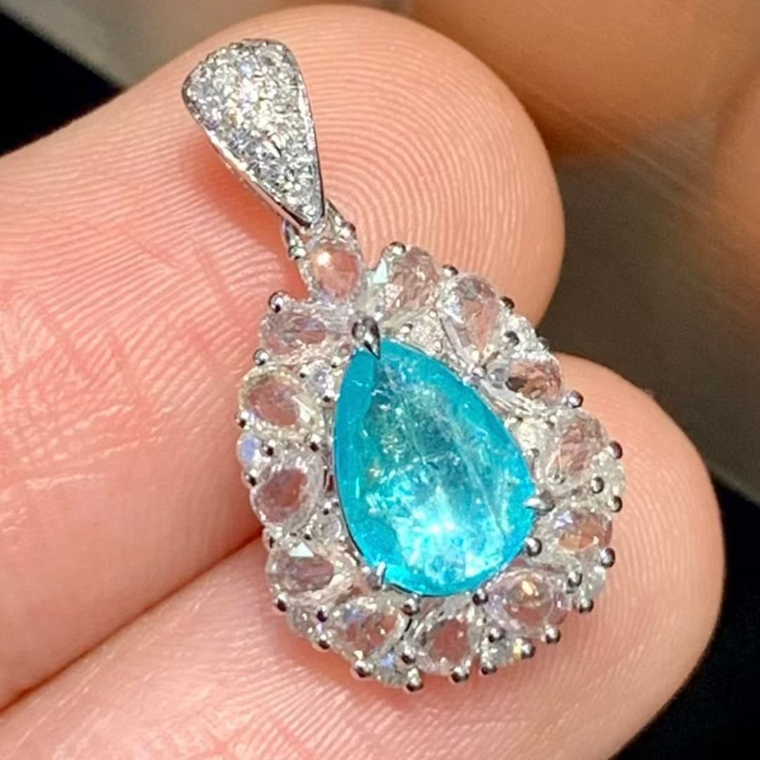 14k Gold 0.6 Ct Natural Paraiba Tourmaline & Diamond & Sapphire Pendant( Without Chain ): Ref:231129194 // gold content:14k gold // main gemstone:paraiba tourmaline // shape:pear // carat weight:0. 6ct // color:blue // treatment:natural // // adjacent gemstone 2 : diamond // shape:round //