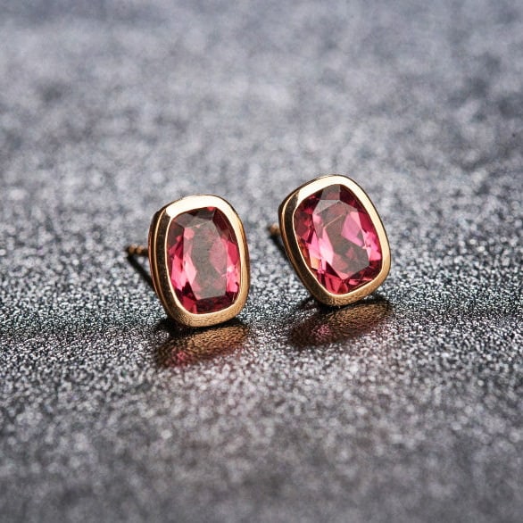 14k Gold 2.58 Ct Natural Tourmaline Earrings: Ref:231129196 // gold content:14k gold // main gemstone:tourmaline // shape:cushion // carat weight:2. 58ct // color:red // treatment:natural // Condition: NewLow Estimate: 1900.00High Estimate: