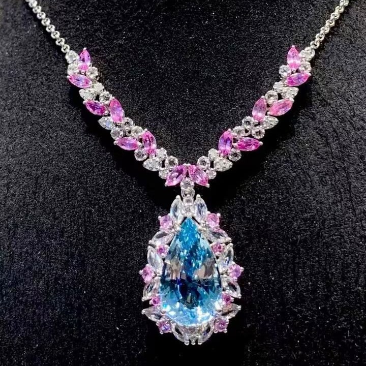 14k Gold 5.29 Ct Natural Aquamarine & Sapphire & Diamond Necklace: Ref:231129198 // gold content:14k gold // main gemstone:aquamarine // shape:pear // carat weight:5. 29ct // color:santa maria color // treatment:natural // // adjacent gemstone 2 : sapphire //