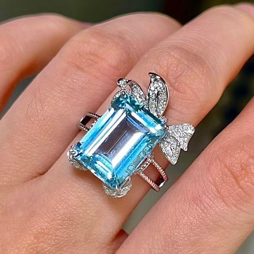 14k Gold 7.22 Ct Natural Aquamarine & Diamond Ring: Ref:231129238 // gold content:14k gold // ring size:7. 25us // // main gemstone:aquamarine // shape:octagonal // carat weight:7. 22ct // color:santa maria color // treatment:natural // // adjacent gem