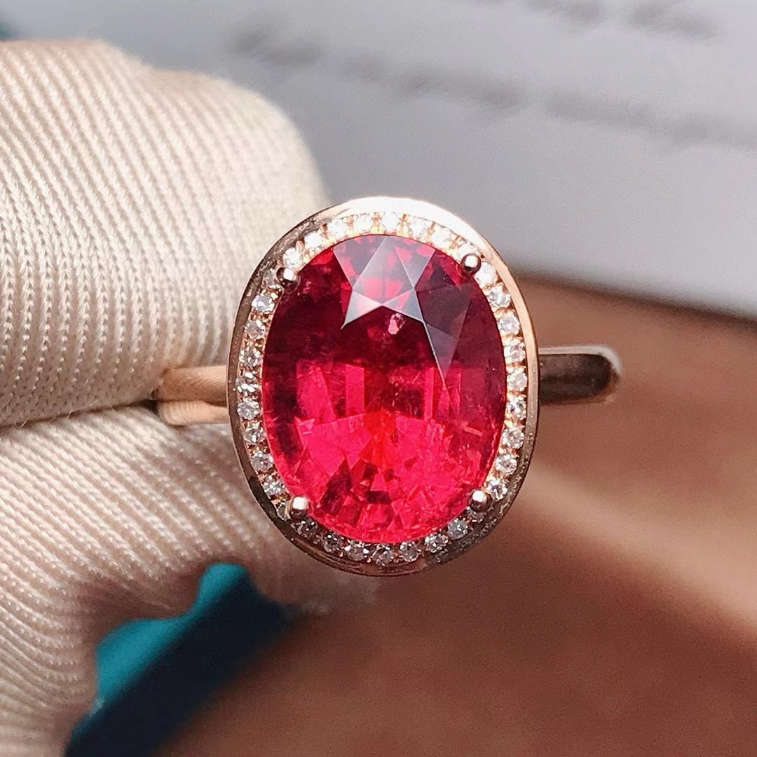 14k Gold 4.75 Ct Natural Tourmaline & Diamond Ring: Ref:231129246 // gold content:14k gold // ring size:7. 25us // // main gemstone:tourmaline // shape:oval // carat weight:4. 75ct // color:red // treatment:natural // // adjacent gemstone 2 :
