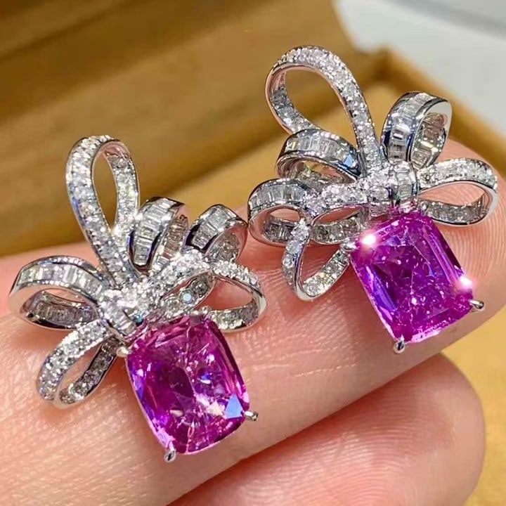 14k Gold 2.3 Ct Natural Sapphire & Diamond Earrings: Ref:231129254 // gold content:14k gold // main gemstone:sapphire // shape:cushion // carat weight:2. 3ct // color:purple // treatment:natural // // adjacent gemstone 2 : diamond // shape:multiple