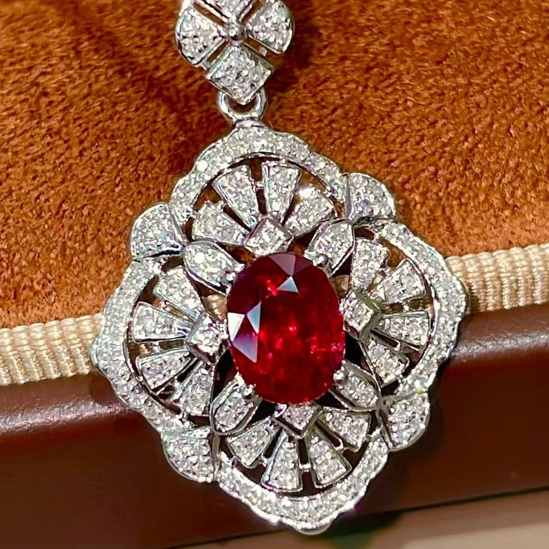 14k Gold 1.40 Ctw Natural Ruby & Diamond Pendant( Without Chain ): Ref:231129258 // gold content:14k gold // main gemstone:ruby // shape:oval // carat weight:1. 02ct // color:red // treatment:natural // // adjacent gemstone 2 : diamond // shape:round // carat