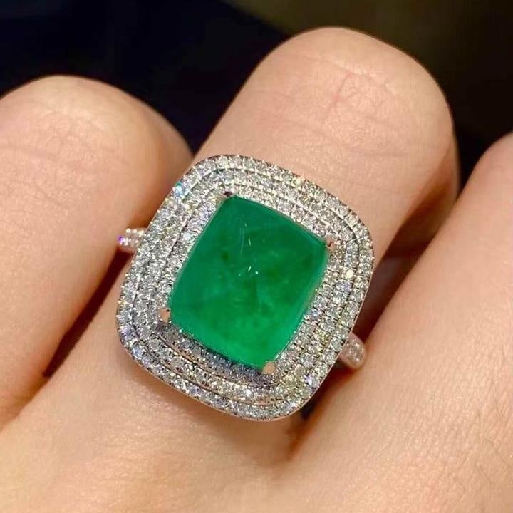 14k Gold 4.35 Ct Natural Emerald & Diamond Ring: Ref:231129260 // gold content:14k gold // ring size:7. 25us // // main gemstone:emerald // shape:sugar-loaf // carat weight:4. 35ct // color:green // treatment:natural // // adjacent gemstone 2 :