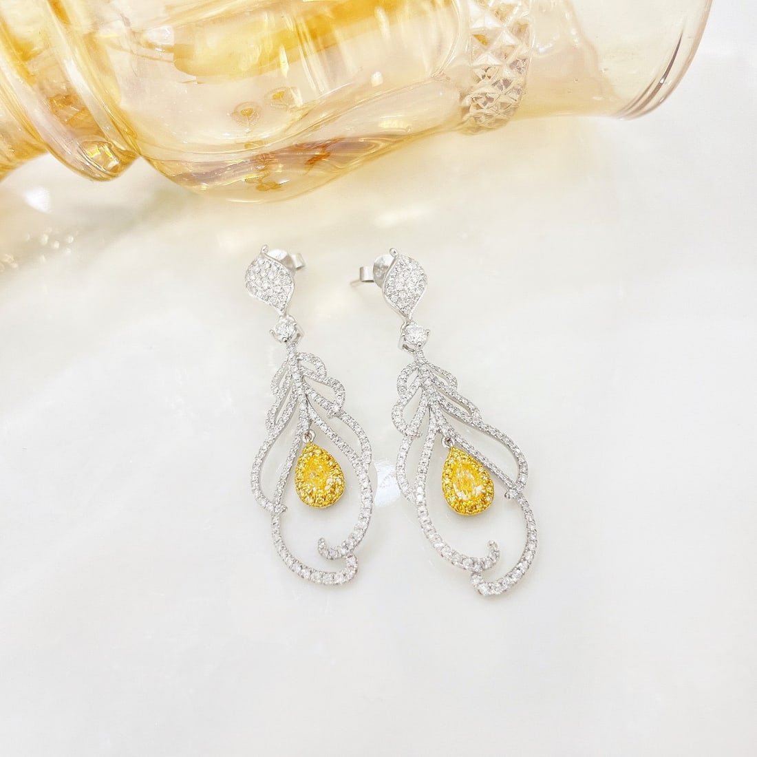 14k Gold 1.44 Ctw Natural Yellow Diamond & Diamond Earrings: Ref:231130016 // gold content:14k gold // main gemstone:yellow diamond // shape:pear // carat weight:0. 50ct // color:yellow // treatment:natural // // adjacent gemstone 2 : diamond // shape:round