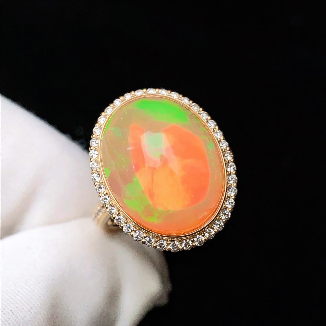 14k Gold 6.13 Ctw Natural Opal & Diamond Ring: Ref:231130080 // gold content:14k gold // ring size:7. 25us // // main gemstone:opal // shape:oval // carat weight:5. 76ct // color:color // treatment:natural // // adjacent gemstone 2 : diamond