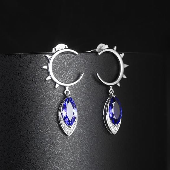 14k Gold 1.55 Ctw Natural Tanzanite & Diamond Earrings: Ref:231130092 // gold content:14k gold // main gemstone:tanzanite // shape:marquise // carat weight:1. 48ct // color:blue // treatment:natural // // adjacent gemstone 2 : diamond // shape:round //