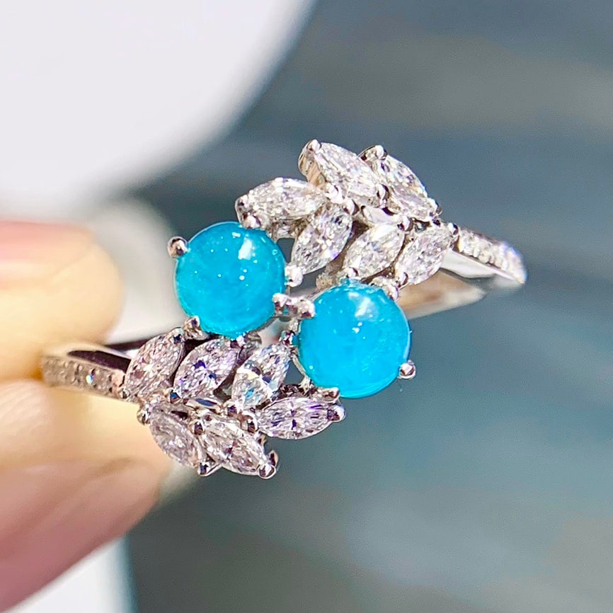 14k Gold 1.12 Ctw Natural Paraiba Tourmaline & Diamond Ring: Ref:231130154 // gold content:14k gold // ring size:7. 25us // // main gemstone:paraiba tourmaline // shape:round // carat weight:0. 58ct // color:blue // treatment:natural // cut grade:g // // adjace