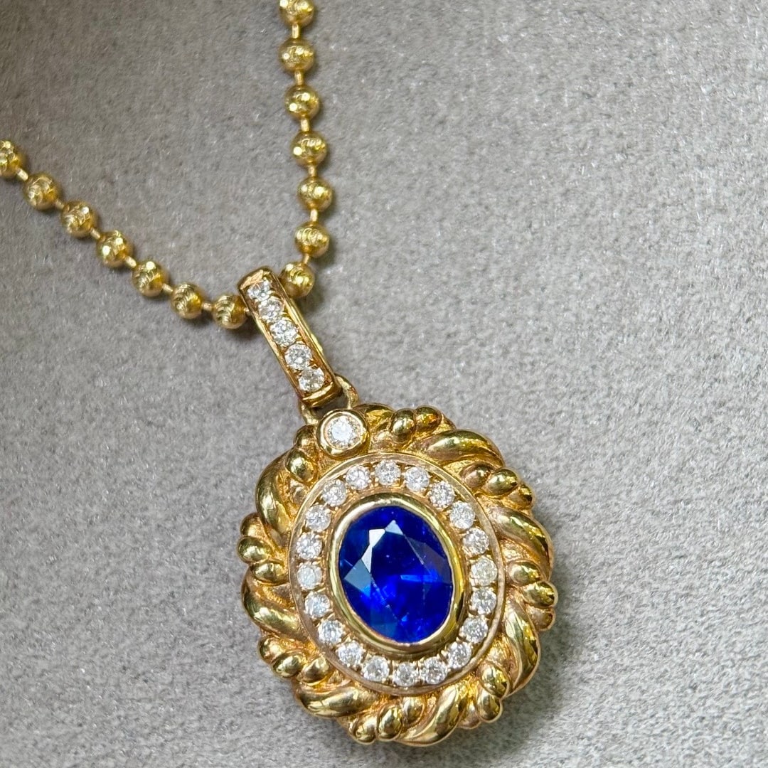14k Gold 0.94 Ctw Natural Sapphire & Diamond Pendant( Without Chain ): Ref:231130167 // gold content:14k gold // main gemstone:sapphire // shape:oval // carat weight:0. 80ct // color:blue // treatment:natural // // adjacent gemstone 2 : diamond // shape:round // carat