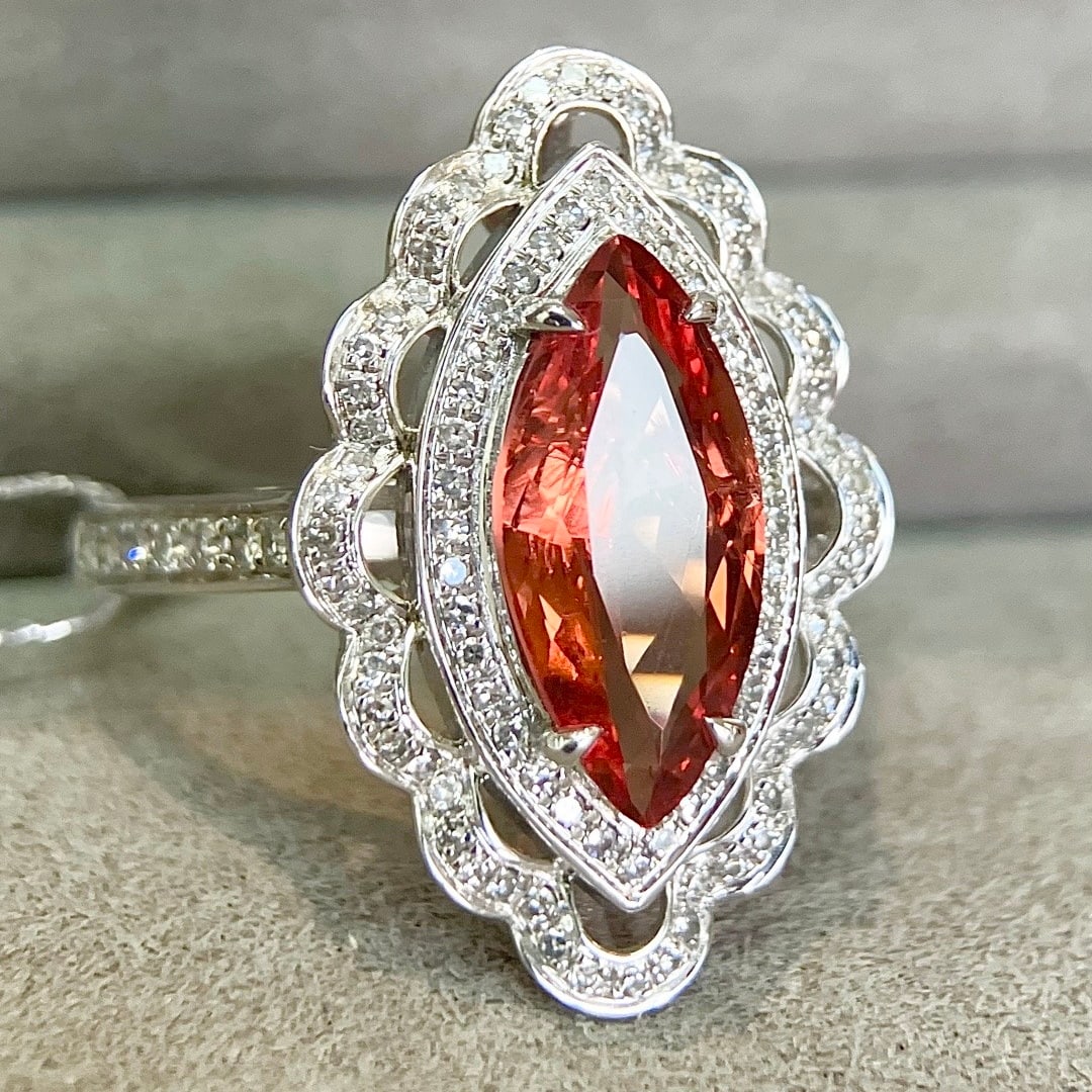14k Gold 2.21 Ctw Natural Spinel & Diamond Ring: Ref:231130168 // gold content:14k gold // ring size:7. 25us // // main gemstone:spinel // shape:marquise // carat weight:1. 76ct // color:orange // treatment:natural // // adjacent gemstone 2 :