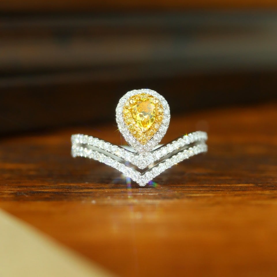 14k Gold 0.80 Ctw Natural Yellow Diamond & Diamond Ring: Ref:231130281 // gold content:14k gold // ring size:7. 25us // // main gemstone:yellow diamond // shape:pear // carat weight:0. 28ct // color:yellow // treatment:natural // // adjacent gemstone 2
